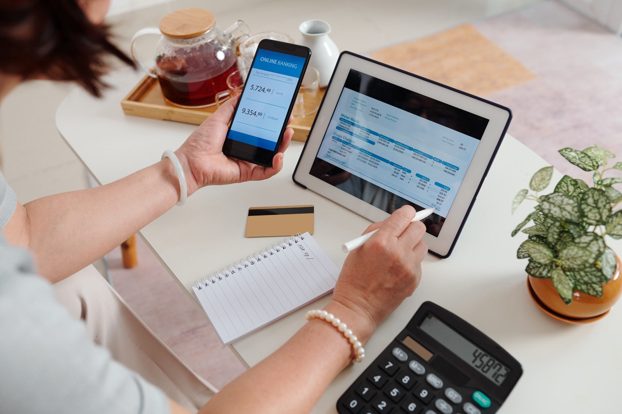 Woman paying utility bill