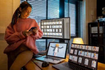 Photographer editing photos at home office