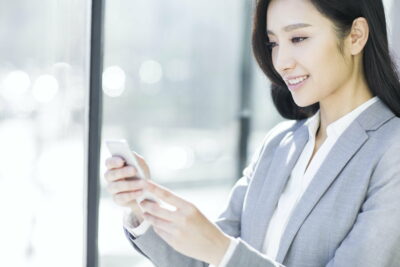 Businesswoman using smart phone