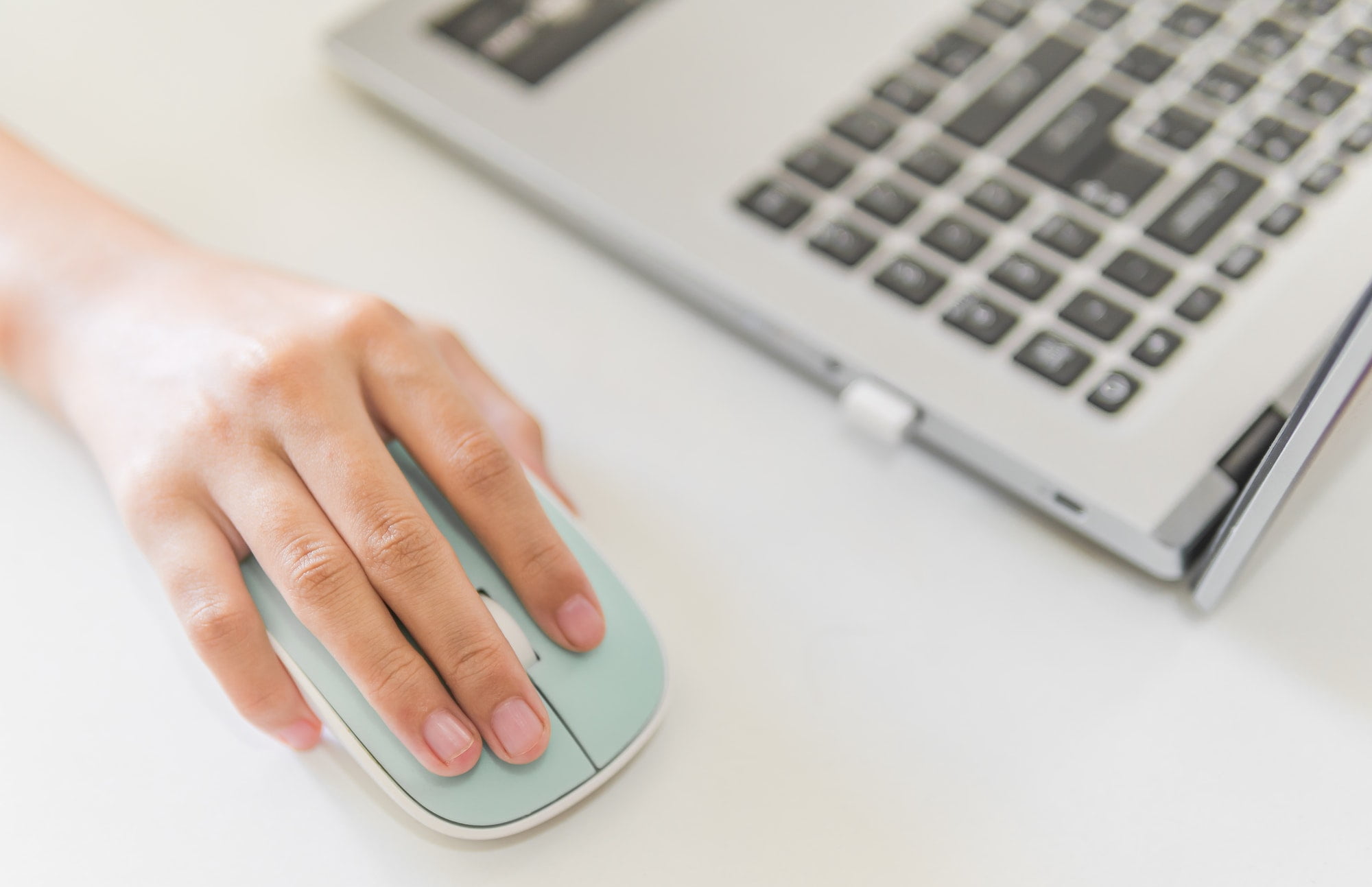 Hand girl cover mouse computer and keyboard laptop for learning online