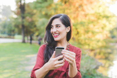 Young woman outdoor using smartphone