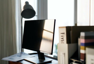 Computer monitor on wooden table