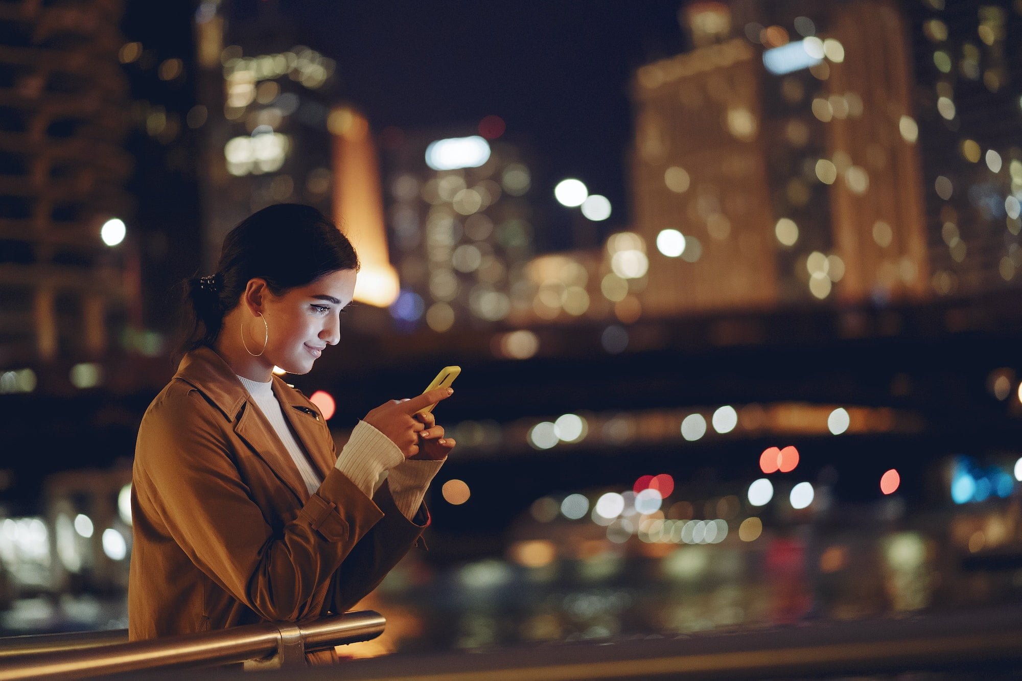 girl at night with phone