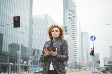 Young woman outdoor using smartphone