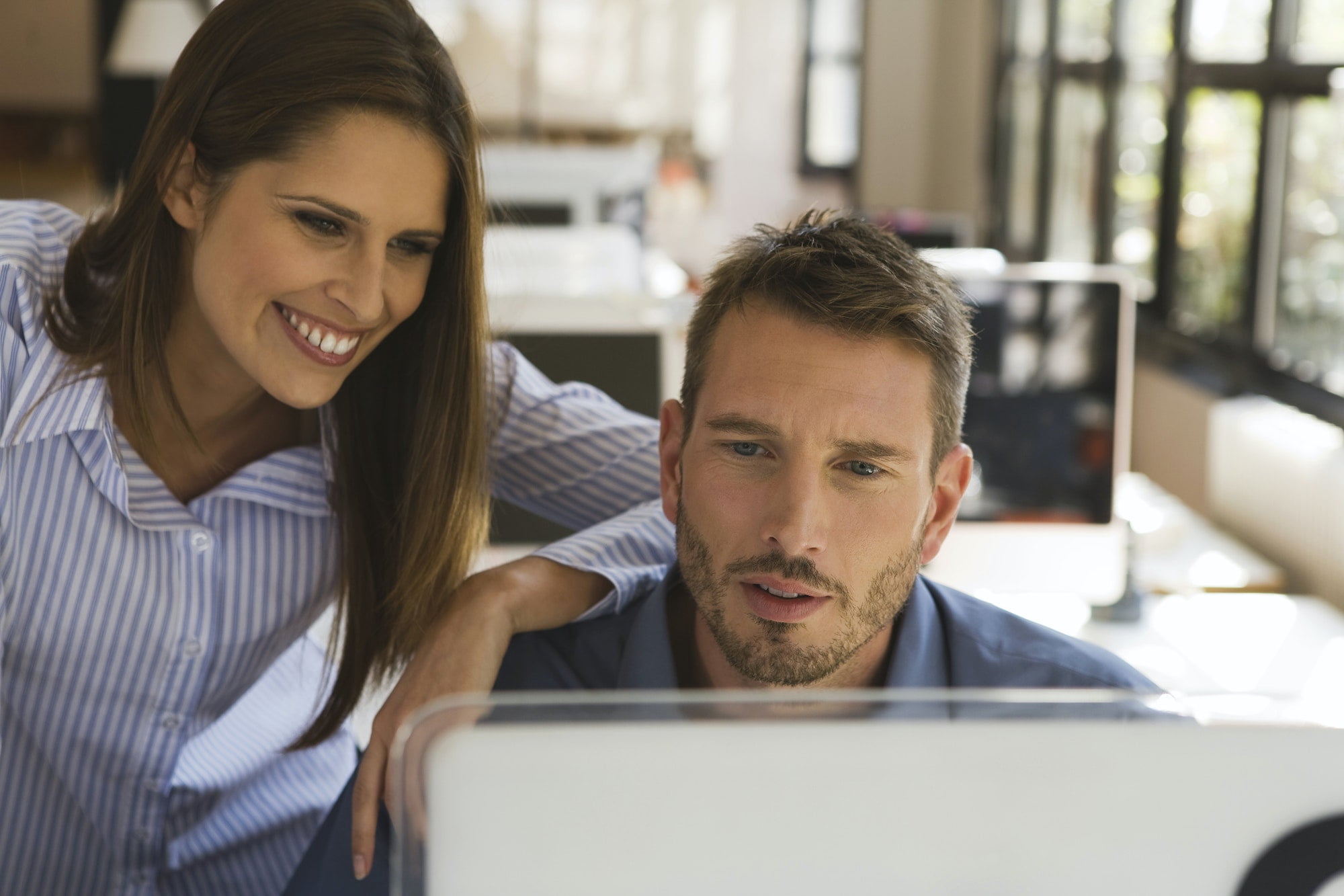 Business people in office using computer