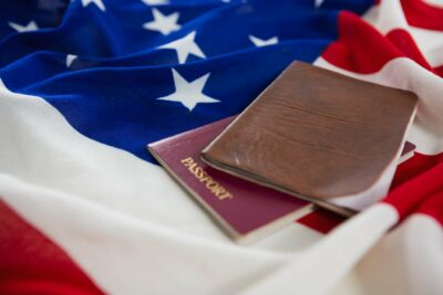 Passport and visa on an American flag