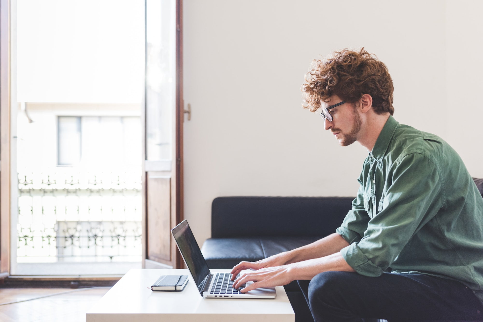 Young man business working computer at home