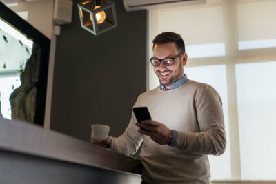 Man surfing the Internet using smart phone