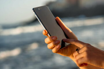 Female hands holding new iPhone 6s Space Gray