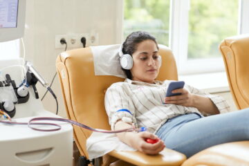 Woman giving her blood